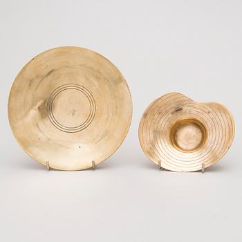 A set of four bowls for Oy Taito Ab.