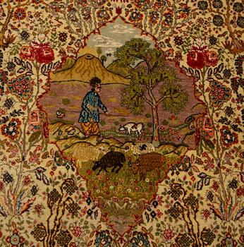 A CARPET, a semi-antique Tabriz probably, figural, ca 325,5 x 226 cm.