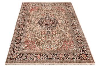 A carpet, silk Kashmir, c. 279 x 180 cm.