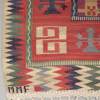 A CARPET, "Bäckahästen", a fine flat weave, 309 x 196,5 cm, signed MMF.