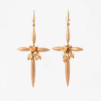 A pair of earrings in 14K and 9K gold with coral and quartz, by Ted Muehling purchased at Svenskt Tenn.
