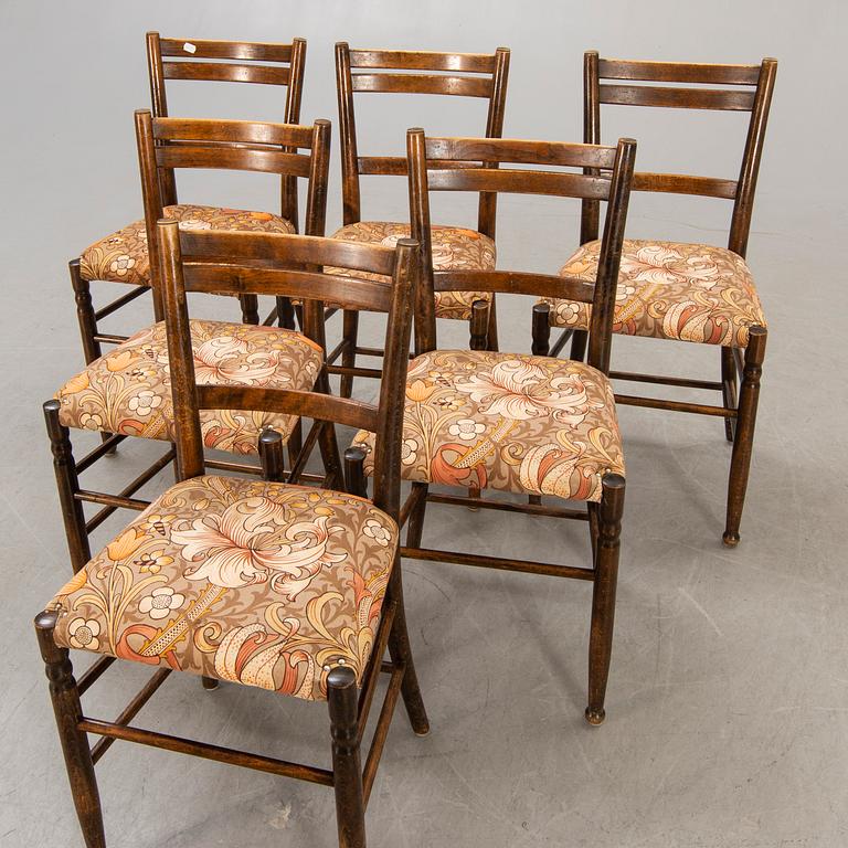 A set of six early 1900s chairs.