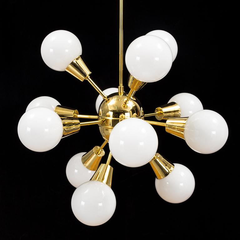 a brass and glas "Sputnik"-model ceiling light from the second half of the 20th century. Height ca 100 cm.
