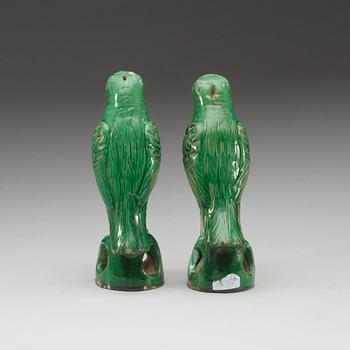 A set of two green glazed falcons, late Qing dynasty.