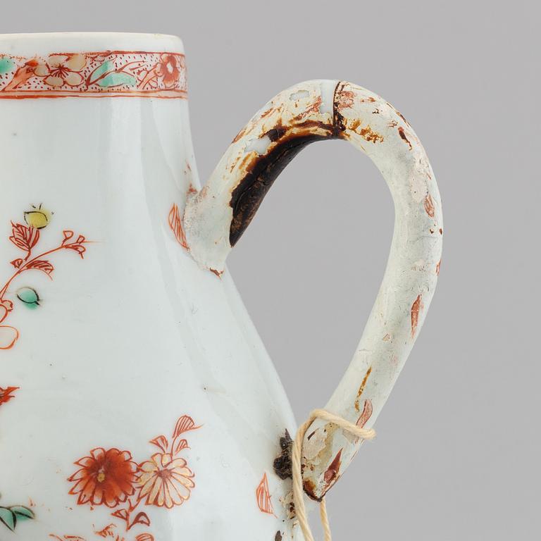 Three famille rose jugs with covers and a vase, Qing dynasty, Qianlong (1736-95).