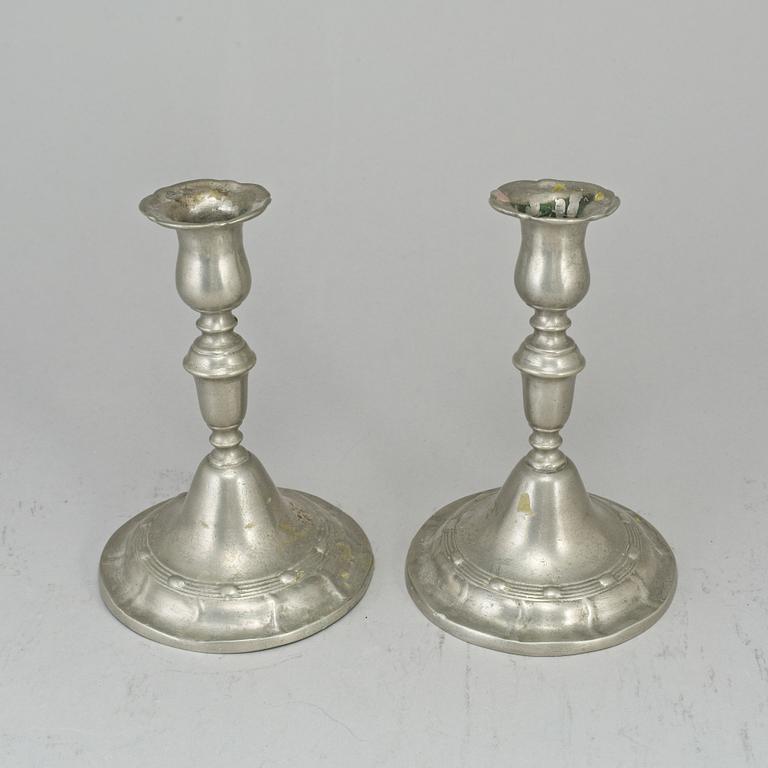 A pair of pewter candlesticks, Lars Claesson Fries, Strängnäs (1760-90).