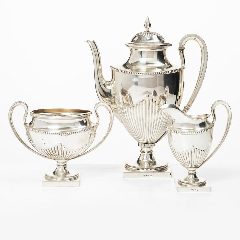 Guldsmedsaktiebolaget (GAB), A Swedish silver Gustavian style coffee pot, creamer and sugar bowl, Stockholm 1910.