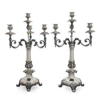 A pair of silver candelabra, maker marks of Carl Johan Tegelsten, Saint Petersburg 1850.