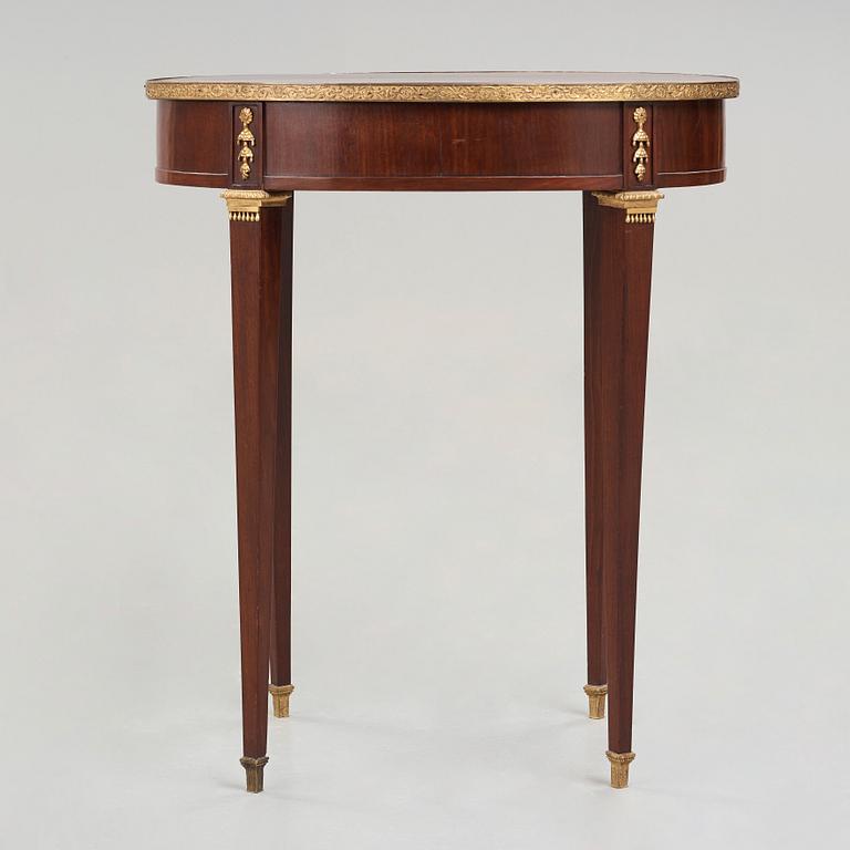 A Directoire late 18th century table.