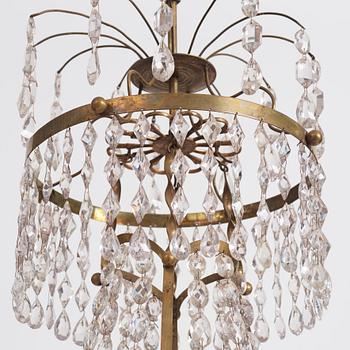 A late Gustavian five-light gilt brass chandelier, late 18th century.