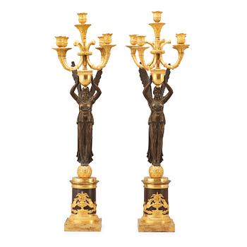 1609. A pair of Empire early 19th century five-light candelabra.
