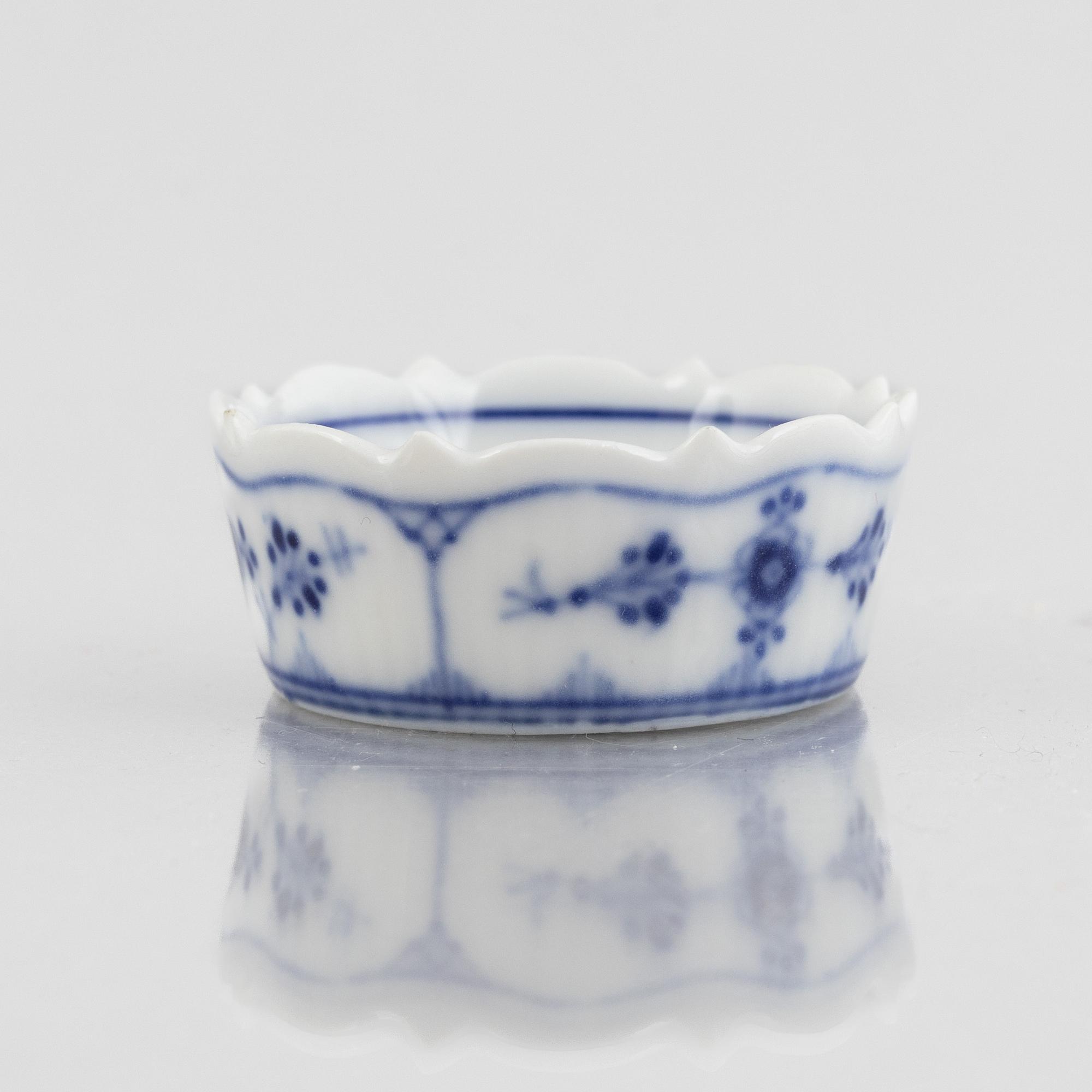 A group of 18 'Blue Fluted' porcelain service parts, Royal Copenhagen, 1893-1923.