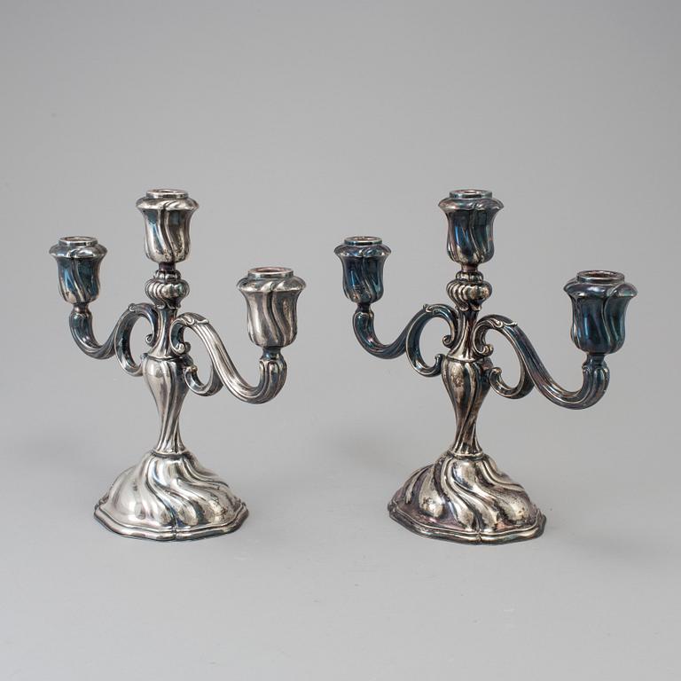 A pair of rokoko-style silver candelabras, GGP, 1943.