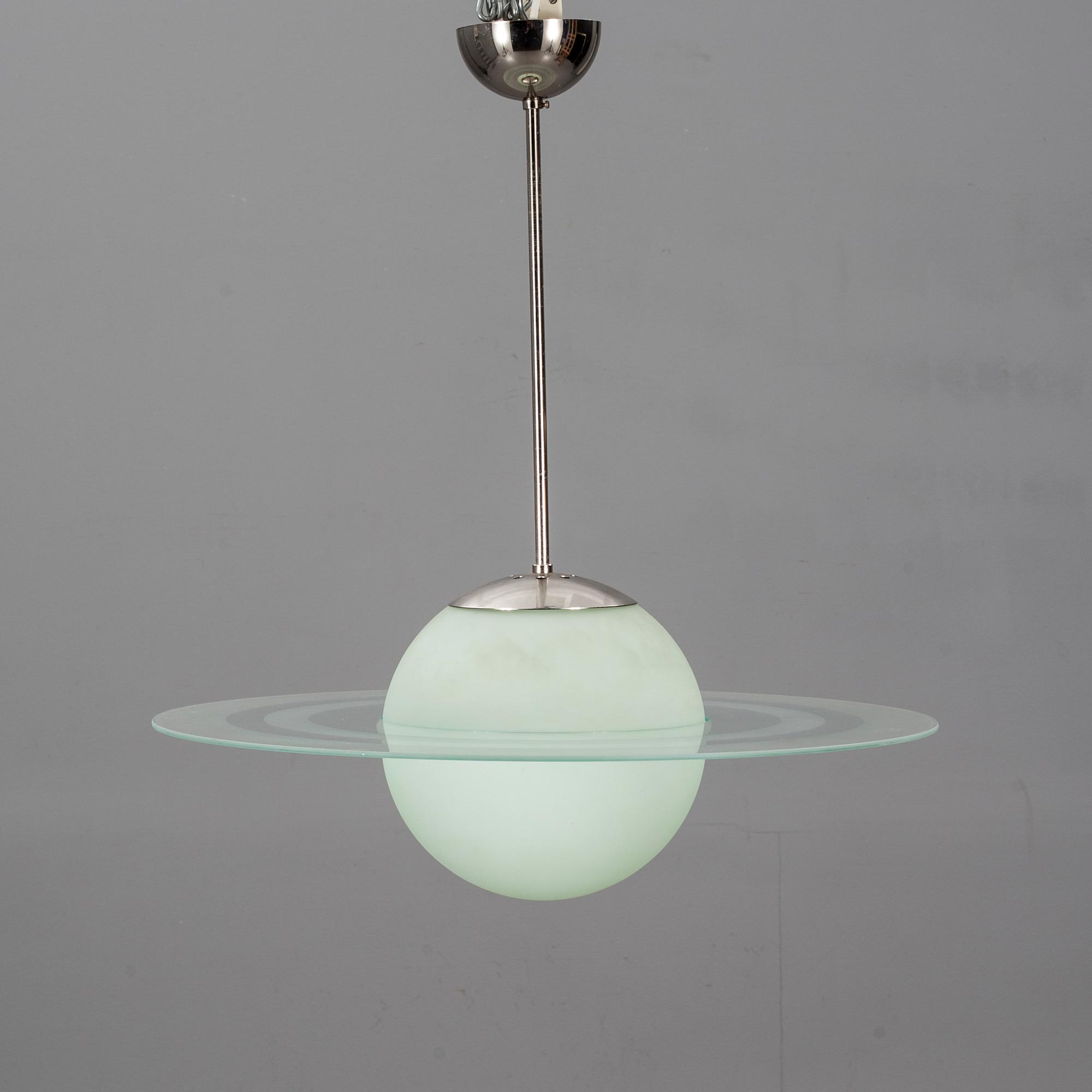 TAKLAMPA, "Saturnus", 1900-talets andra hälft.