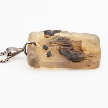 An inscribed and well carved agate 'Scholar and attendant' pendant, Qing dynasty, probably 19th century.