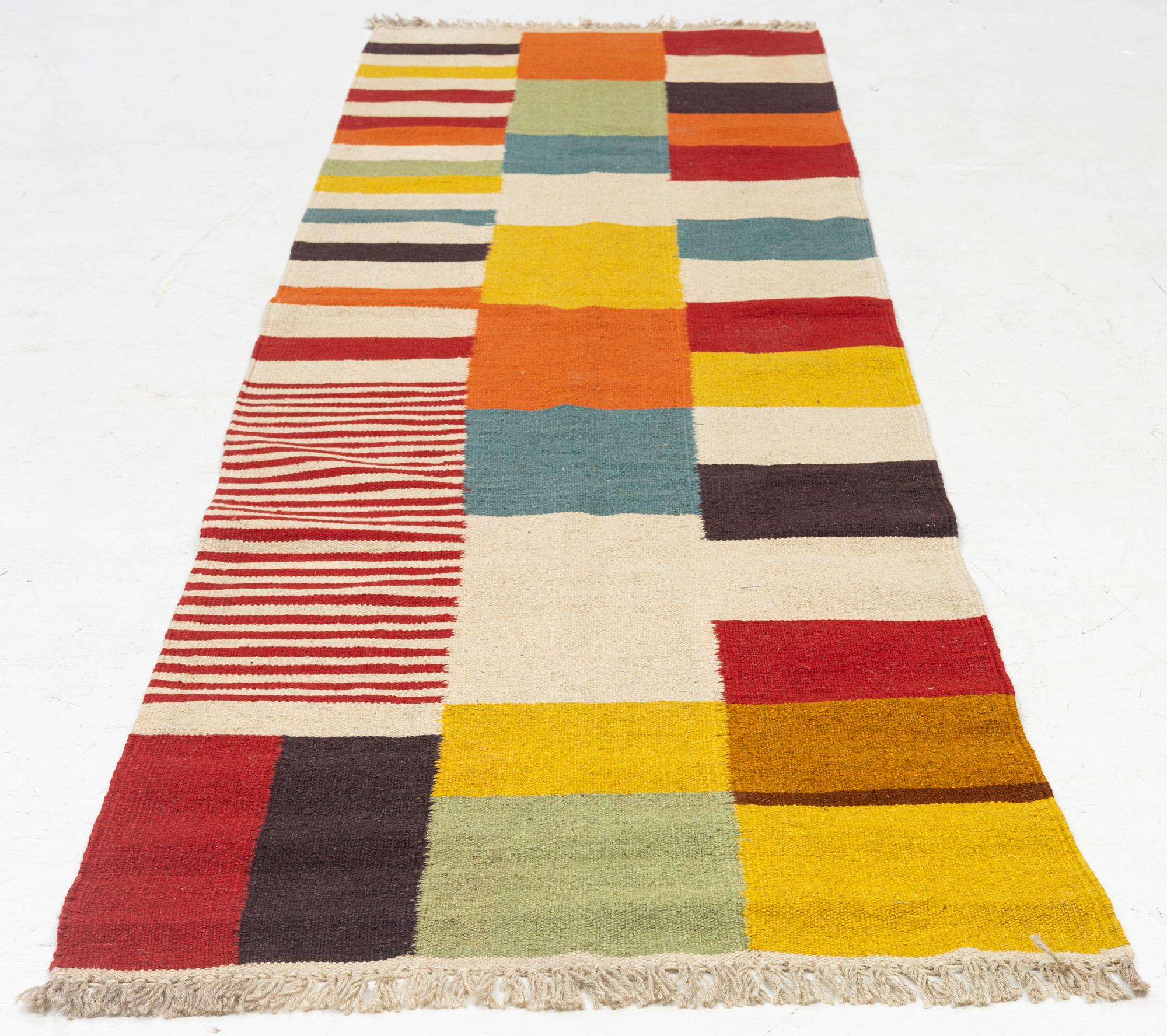 A Kilim runner, c. 295 x 80 cm.