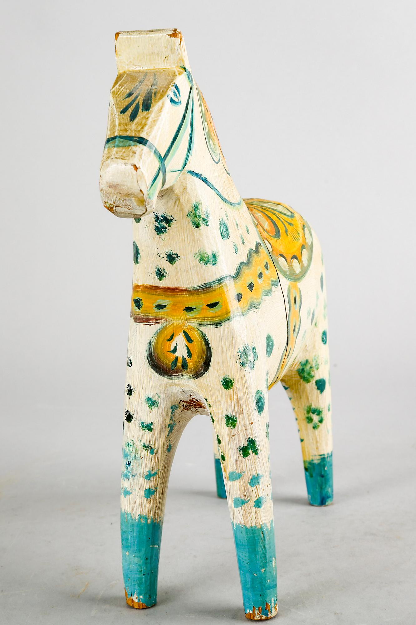 An early 20th century wooden horse, "Dalahäst".