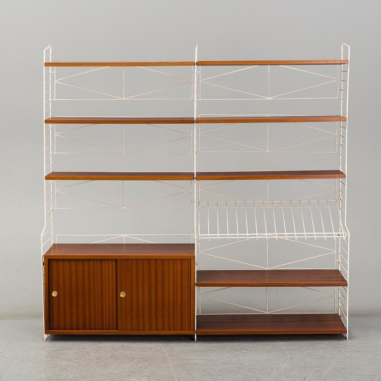 A 'String" bookcase, designed by  Nils Strinning,