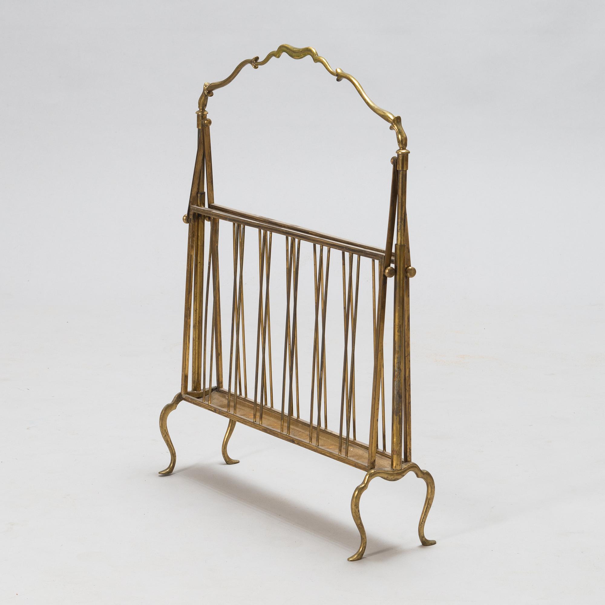 A folding brass magazine stand, first half of the 20th century.