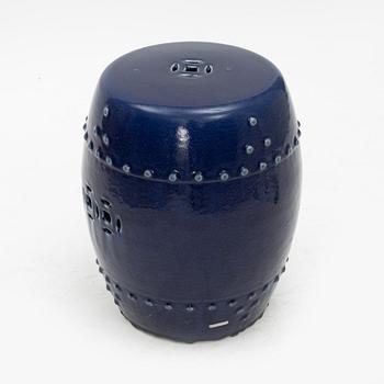 A barrel shaped Chinese blue glazed garden seat, 20th century.