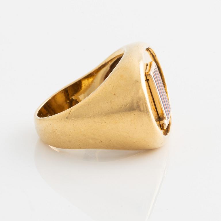 A ring with Broström´s flag in 18K gold and enamel.