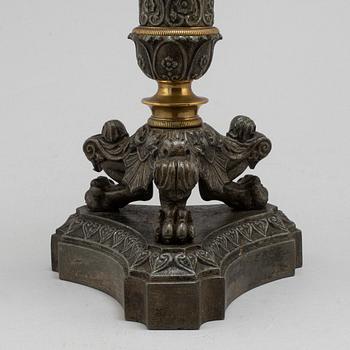 A mid 19th century late empire candlestick.