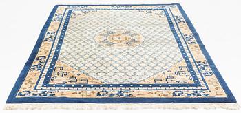 A carpet, China, antique finish, ca 275 x 185 cm.