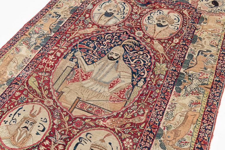 An antique pictoral Kerman Raver rug, c. 212 x 138 cm.