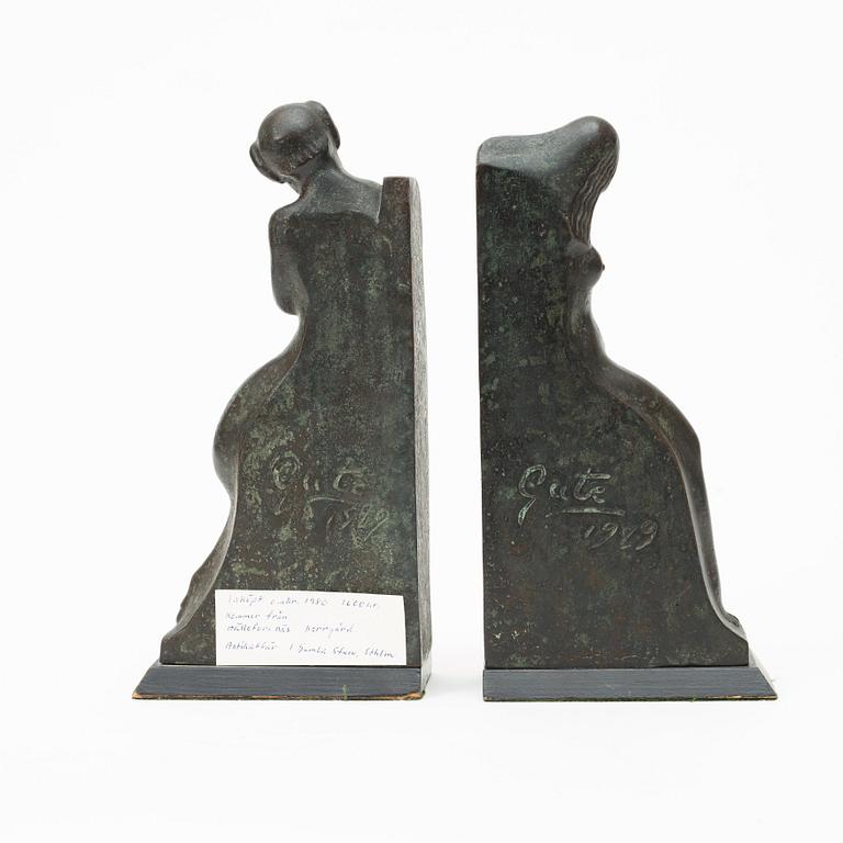 A pair of Axel Gute patinated bronze bookends, Sweden 1929.