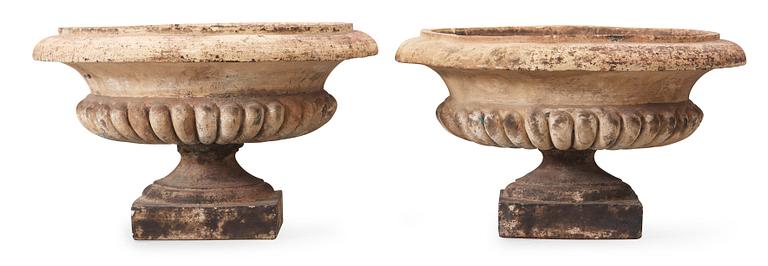 A pair of English 19th century stoneware garden urns.
