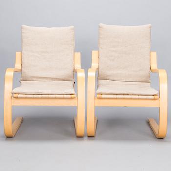 ALVAR AALTO, Pair of model '406' armchairs for Artek, late 20th century .