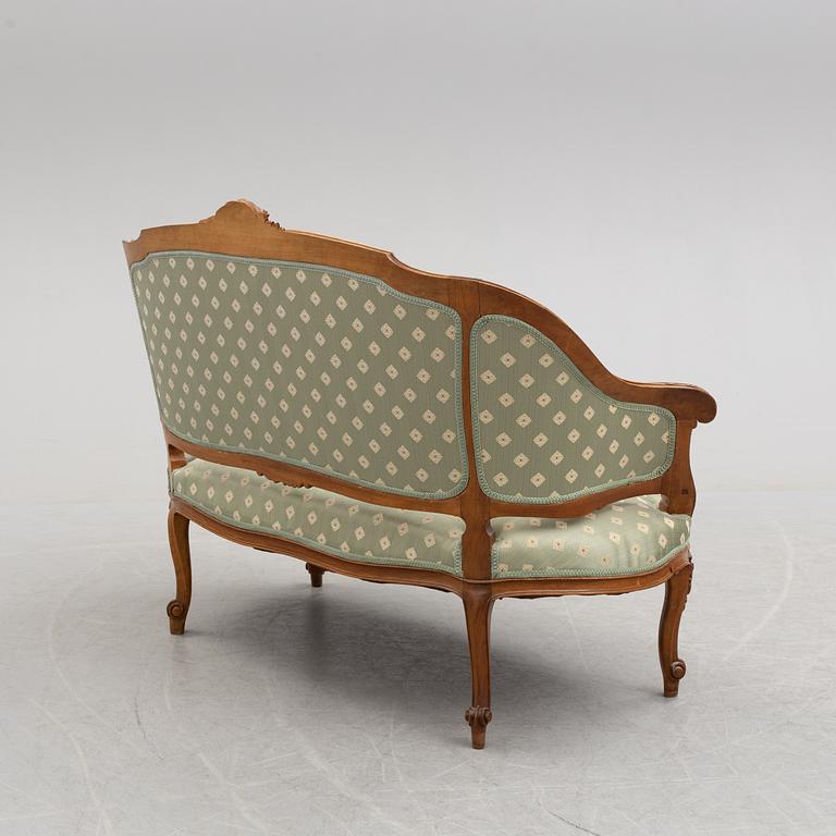 A first half of the 20th century rococo style sofa.