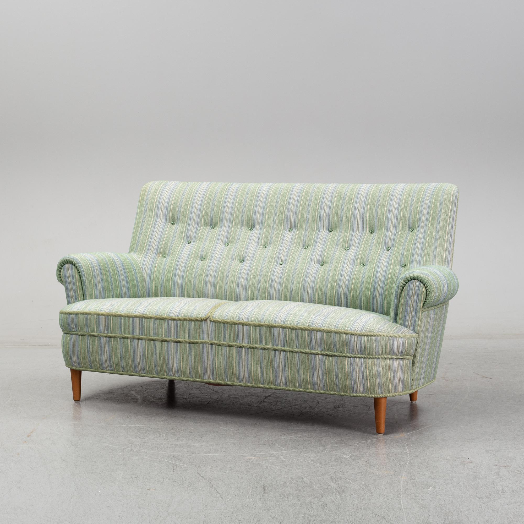 A second half of the 20th Century sofa by Carl Malmsten.