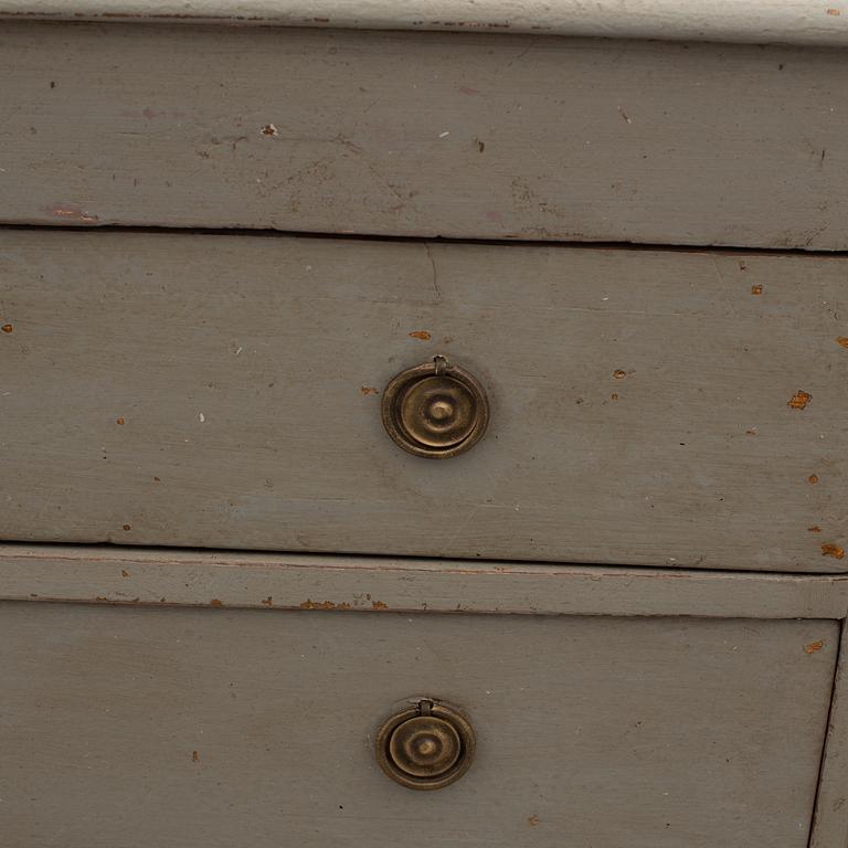 A first half of the 19th century painted chest of drawers.