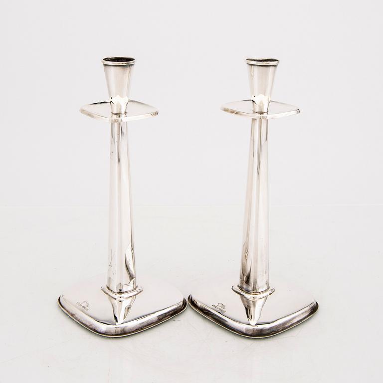 A Swedish 20th century pair of sivler candle sticks mark of Tesi Gothenburg 1959.