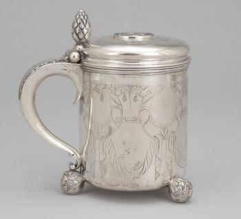 A Baroque style tankard with no silver marks.