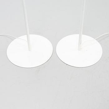 A pair of whithe floor lights, Luxus, Vittsjö.