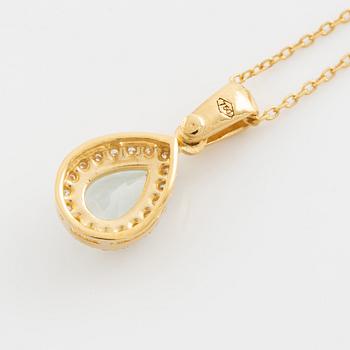 18K gold, light aquamarine and brilliant cut diamond necklace.