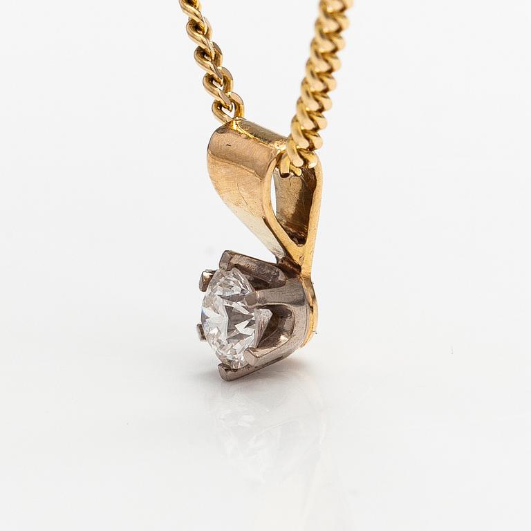 A 14K gold neckalce with a ca. 0.45 ct diamond according to engraving.