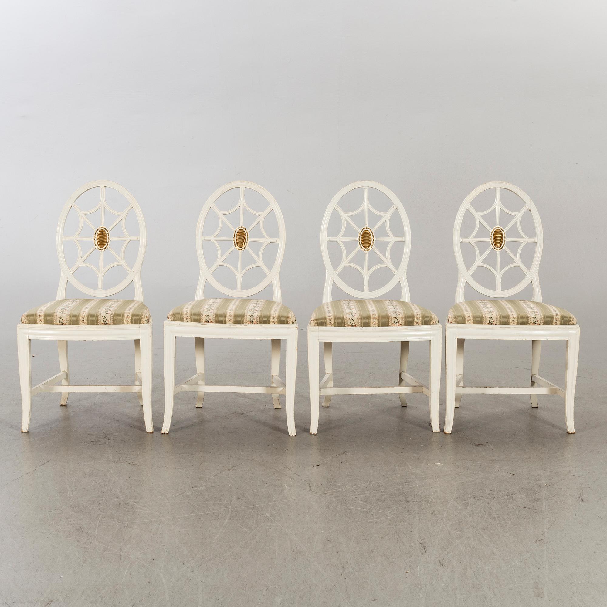 Four first half of the 20th century gustavian style chairs.