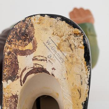 A West German earthenware gnome figurine with lantern from the second half of the 20th century.