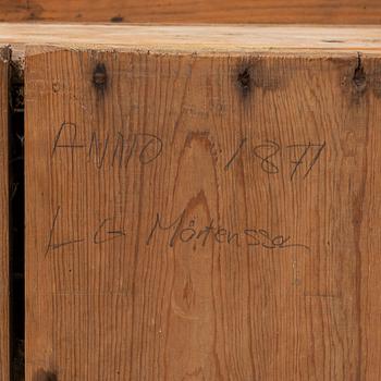 A late 19th century pine cupboard for eggs.