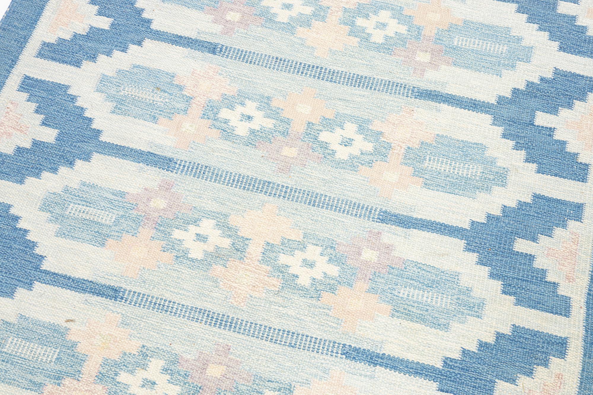 Ingegerd Silow, a flat weave rug, signed IS, c. 195 x 140 cm.