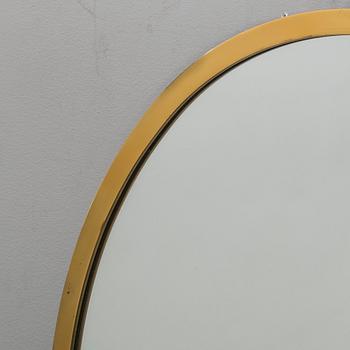 A 20th century brass mirror.