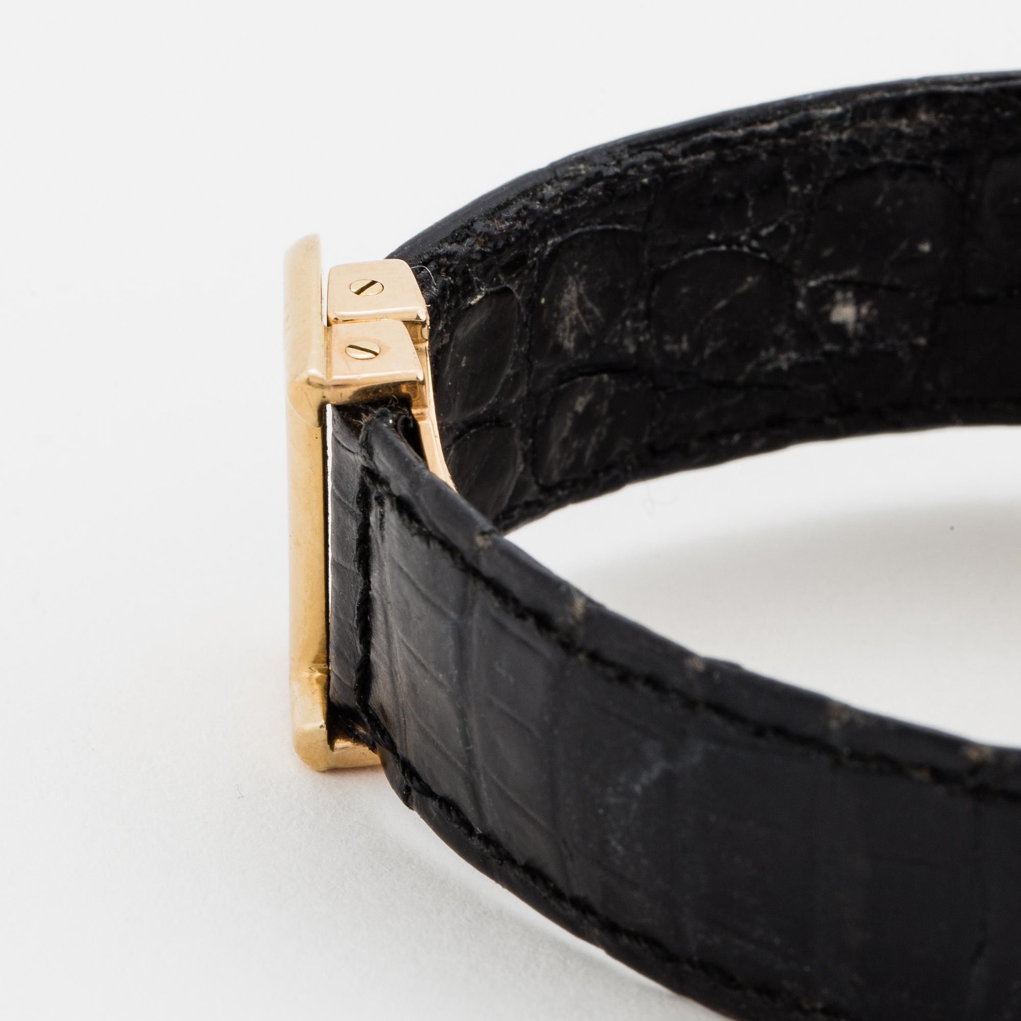 Cartier, Tank, wristwatch, 20,5, x 20 (28) mm.