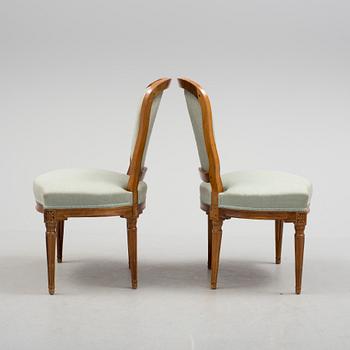 A pair of chairs, circa 1800.