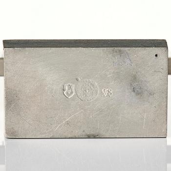 Nils Fougstedt, a pair of pewter candelabra model "A 1047", Firma Svenskt Tenn, Stockholm 1932.