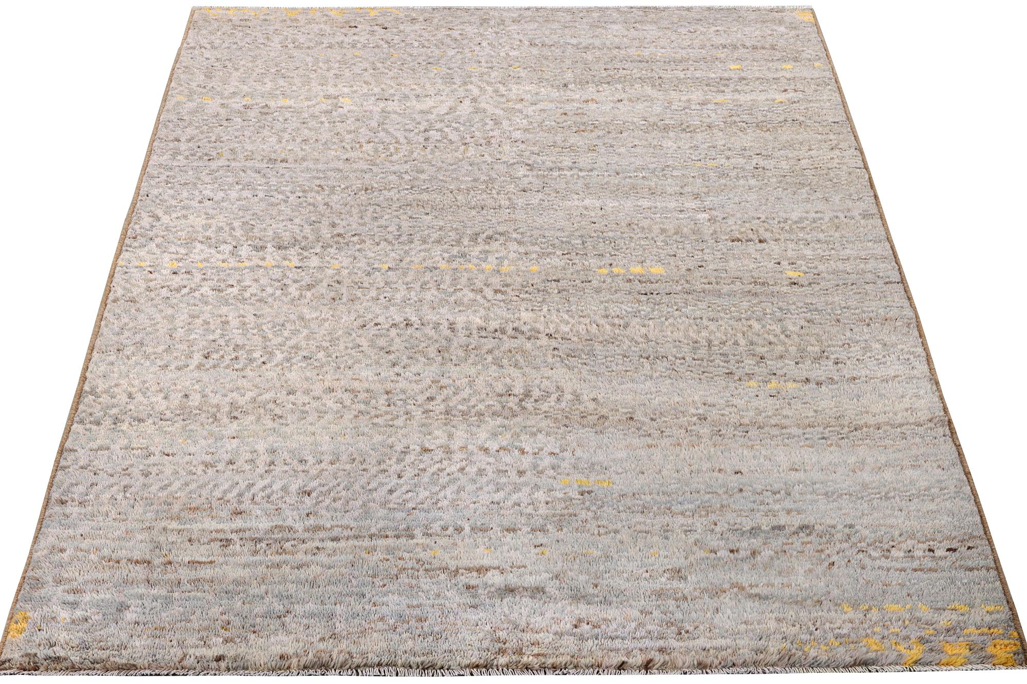 A Moroccan rug, c. 233 x 170 cm.