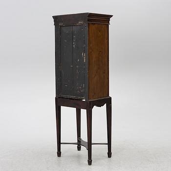 Display cabinet, likely England 19th century.