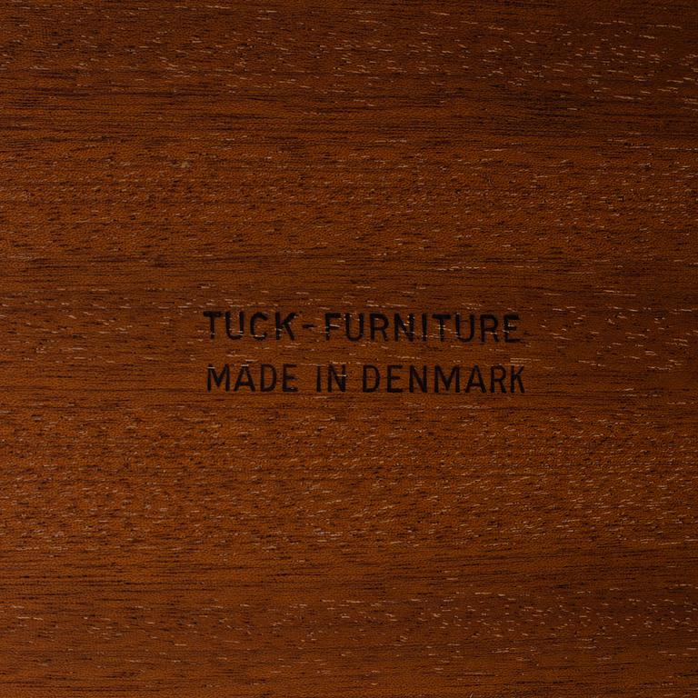 A Hans J Wegner serving trolley veneered with teak.